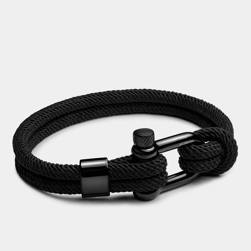 Close-up of black 316L stainless steel clasp on a recycled nylon bracelet